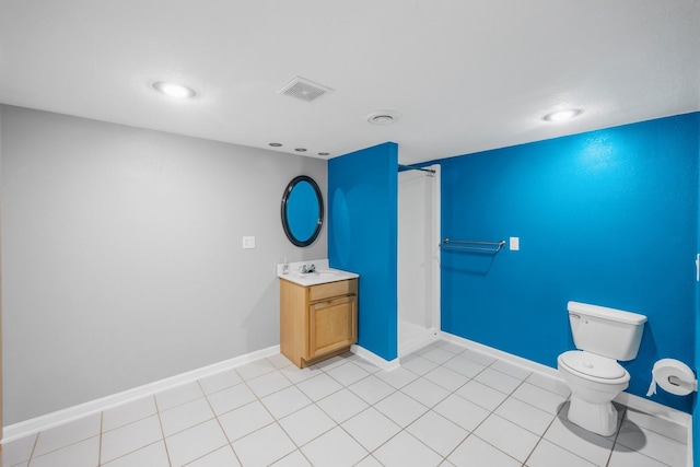 bathroom with tile patterned floors, vanity, toilet, and a shower with curtain