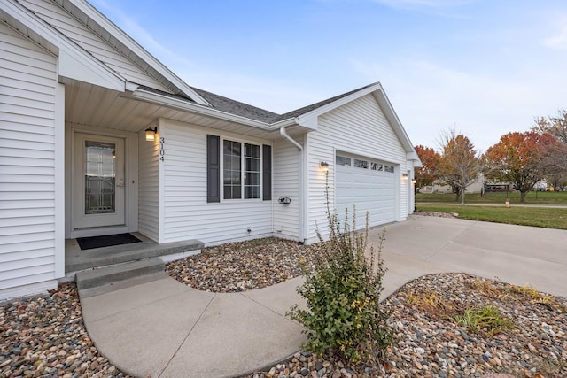 doorway to property featuring a garage