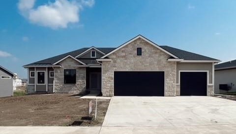 view of front of property with a garage