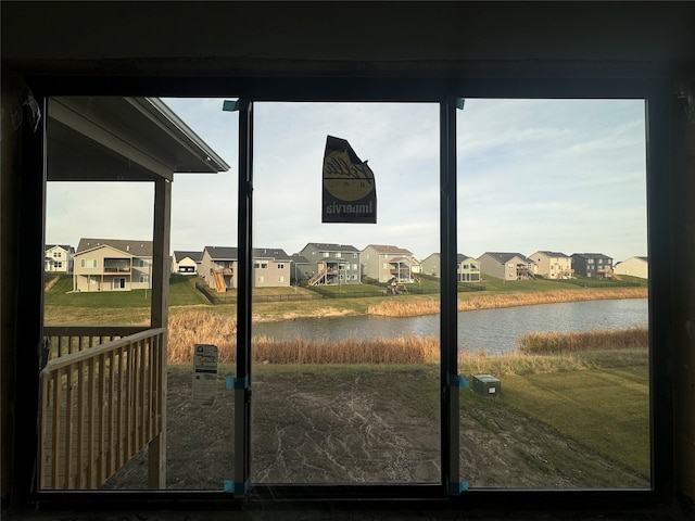 doorway featuring a water view