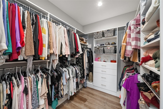 spacious closet with light wood-style flooring