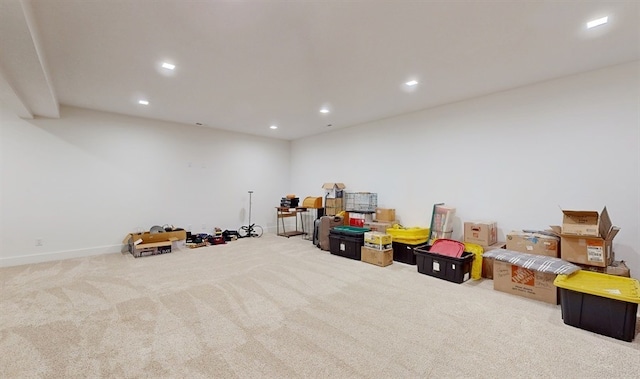 rec room with light carpet