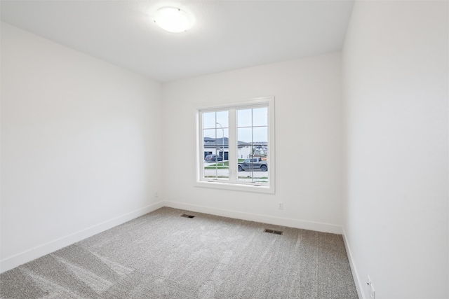 empty room with carpet floors