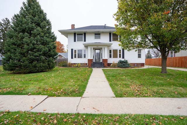 view of front of house featuring a front lawn