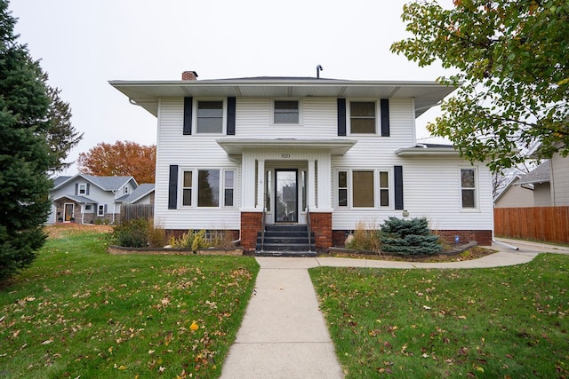 view of front of house with a front lawn