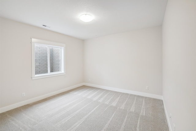 empty room featuring carpet