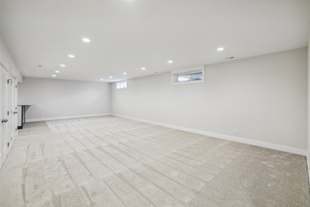 basement with light carpet