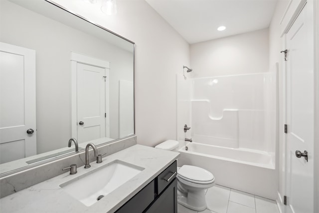 full bathroom featuring tile patterned floors, vanity, toilet, and bathtub / shower combination