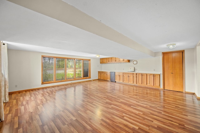 unfurnished living room with light hardwood / wood-style floors