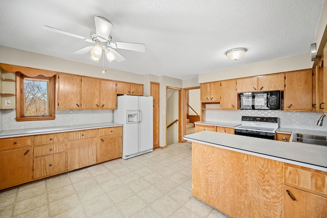 kitchen with backsplash, a textured ceiling, white appliances, ceiling fan, and sink