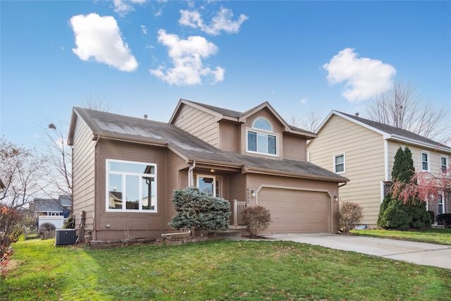 view of front of house featuring cooling unit, a garage, and a front yard