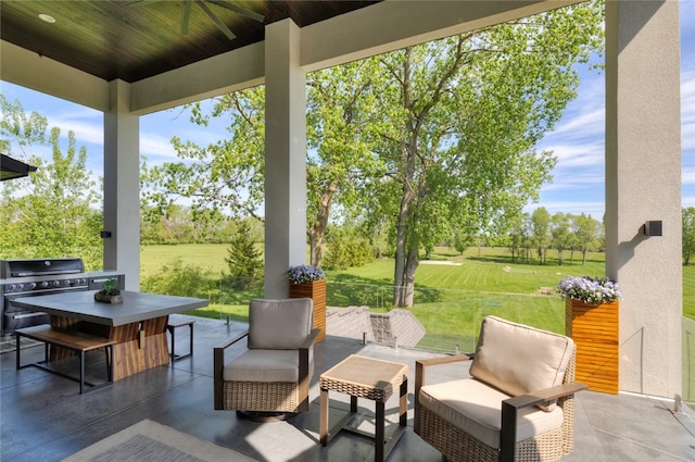 view of patio featuring a grill