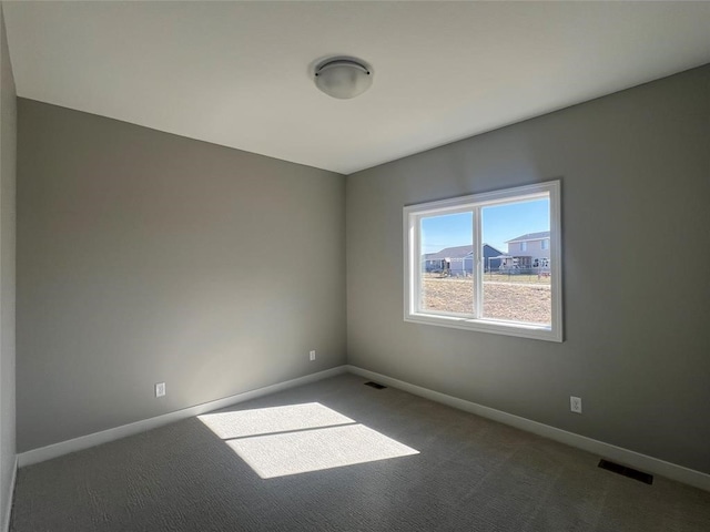 view of carpeted spare room