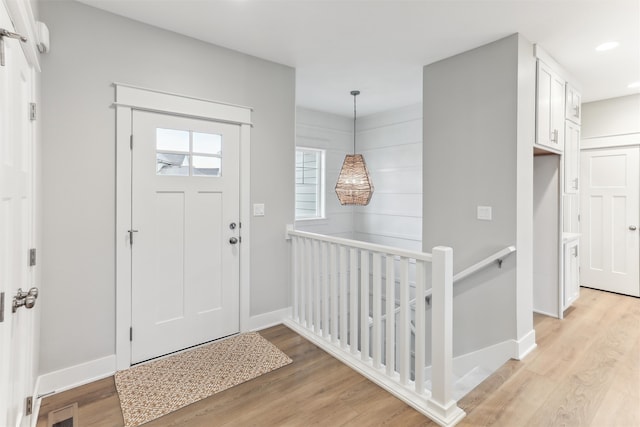 entrance foyer with light hardwood / wood-style flooring