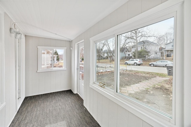 unfurnished sunroom with a wealth of natural light