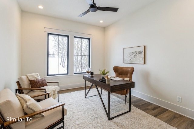 office with ceiling fan and dark wood-type flooring