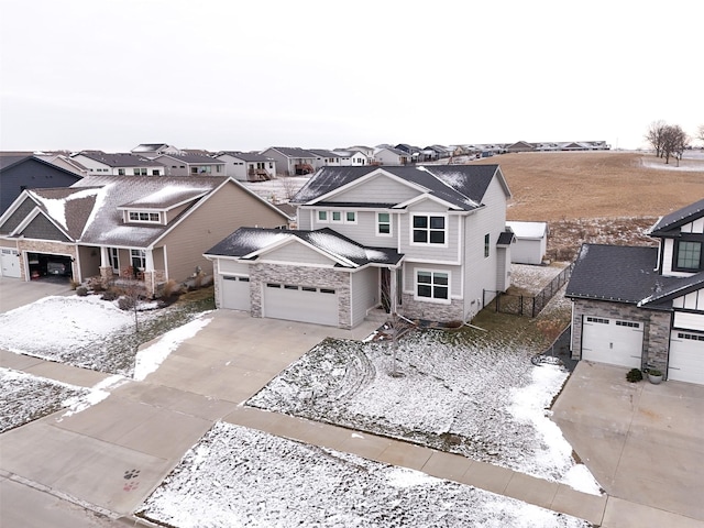 view of front of property featuring a garage