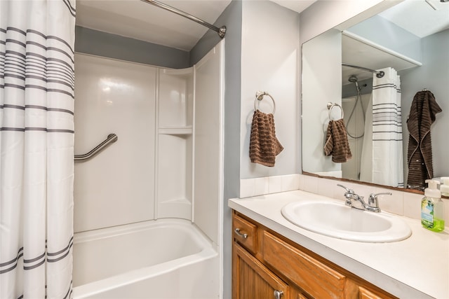 bathroom with vanity and shower / bathtub combination with curtain