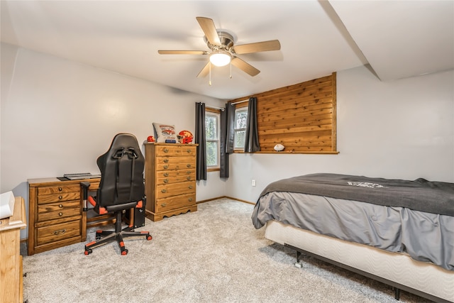 bedroom featuring ceiling fan and light colored carpet