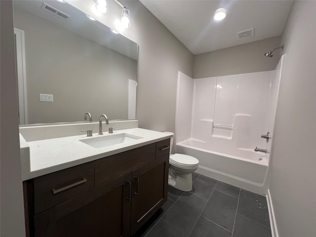 full bathroom with tile patterned floors, bathtub / shower combination, toilet, and vanity