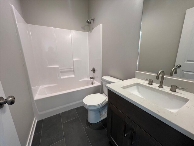 full bathroom with toilet, vanity, tub / shower combination, and tile patterned floors