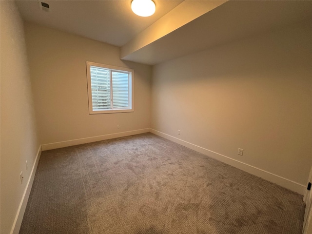 empty room featuring carpet