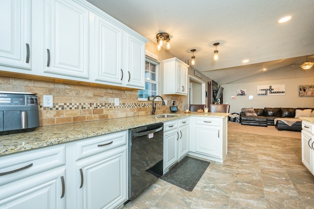 kitchen featuring white cabinetry, black dishwasher, and vaulted ceiling