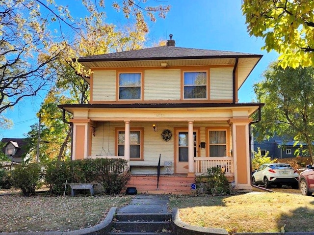 view of front of home featuring covered porch