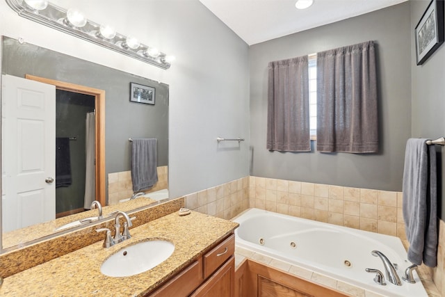 201 Elm Ave, Norwalk, IA 50211 - bathroom featuring a whirlpool tub and vanity