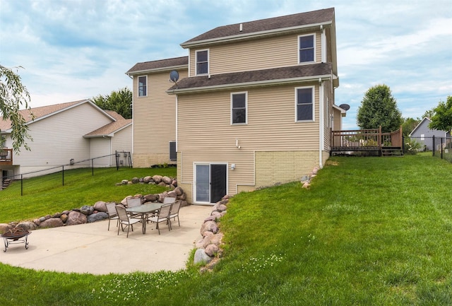 201 Elm Ave, Norwalk, IA 50211 - back of house featuring a patio and a fire pit