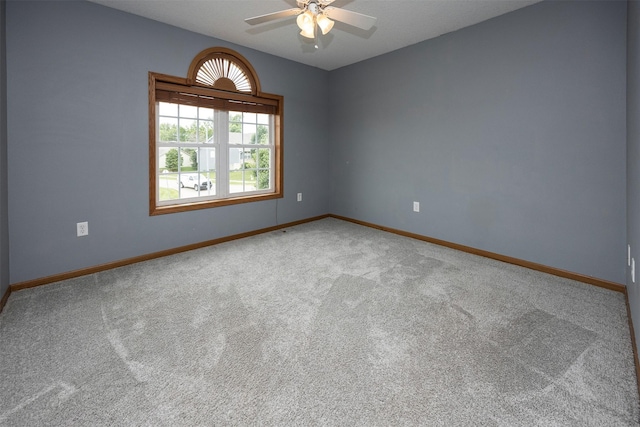 201 Elm Ave, Norwalk, IA 50211 - empty room featuring carpet floors and a ceiling fan
