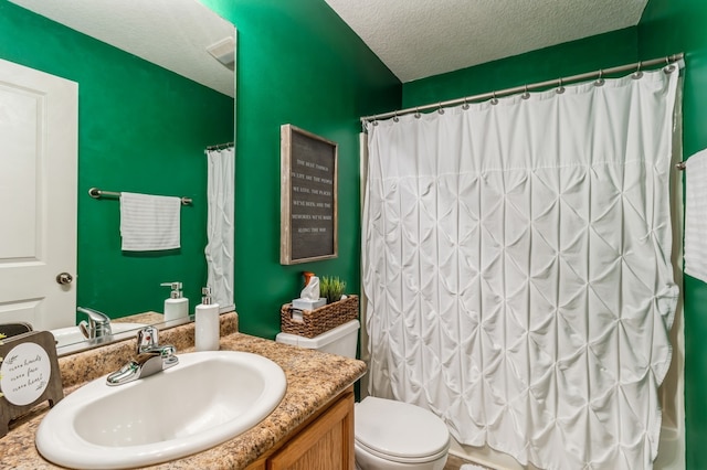 full bathroom with vanity, toilet, shower / bathtub combination with curtain, and a textured ceiling