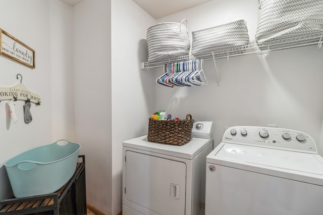 laundry room featuring washing machine and dryer