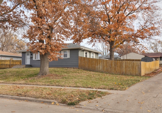 view of property exterior featuring a yard