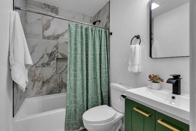 full bathroom featuring vanity, toilet, and shower / tub combo