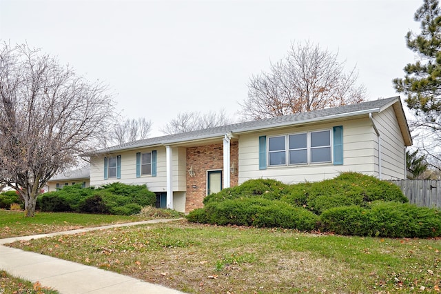 view of front facade with a front lawn