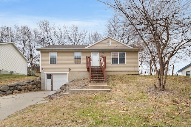 view of front of home with driveway and an attached garage