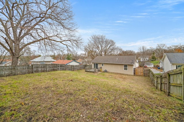 view of yard featuring a fenced backyard