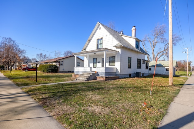 view of property exterior with a porch, a yard, and central air condition unit