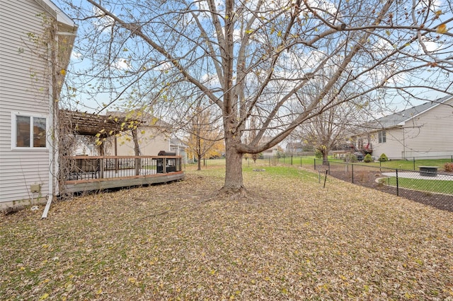 view of yard featuring a wooden deck