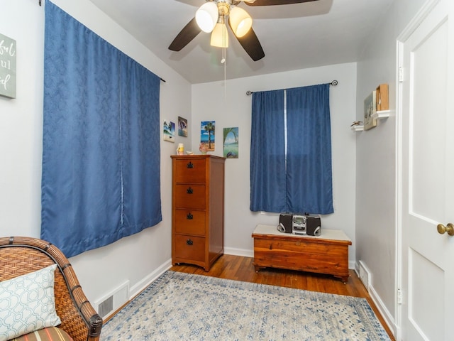 bedroom featuring hardwood / wood-style flooring and ceiling fan