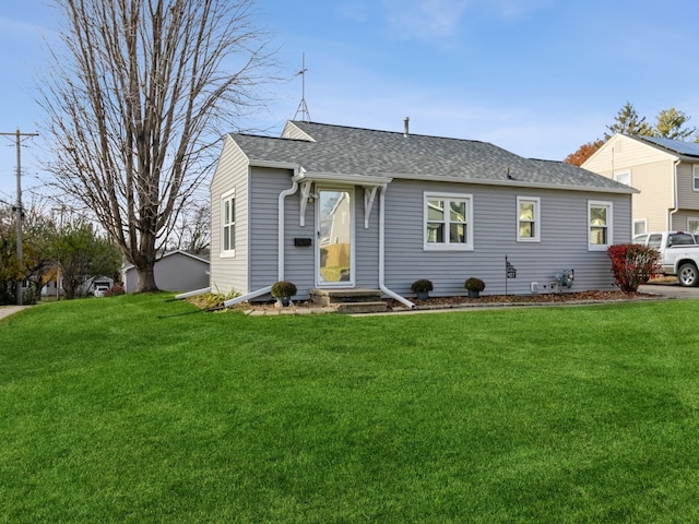 single story home with a front yard