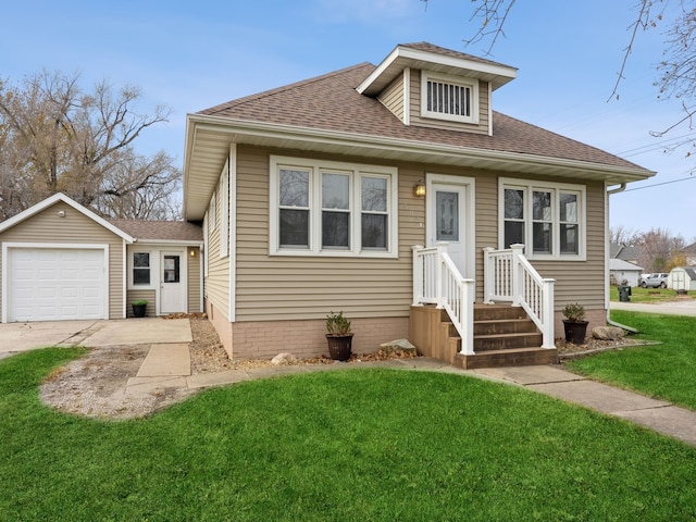 view of front of house featuring a front lawn, an outdoor structure, and a garage