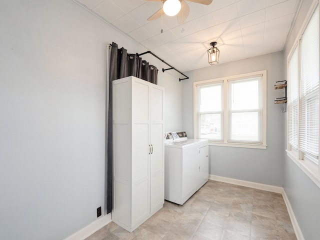 laundry room featuring cabinets, separate washer and dryer, and ceiling fan