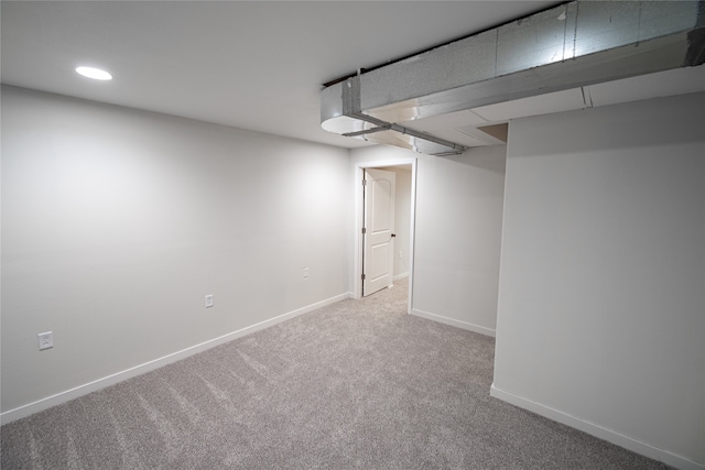 basement with carpet flooring