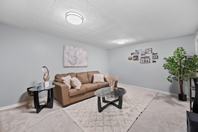 living room with light colored carpet and a textured ceiling