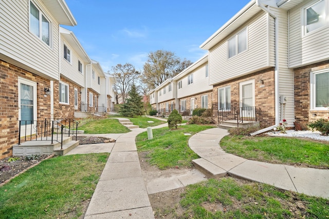 view of community with a yard