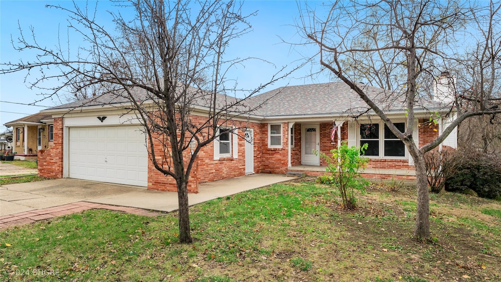 ranch-style home with a garage