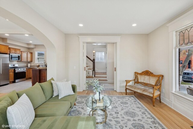 living room with light hardwood / wood-style flooring