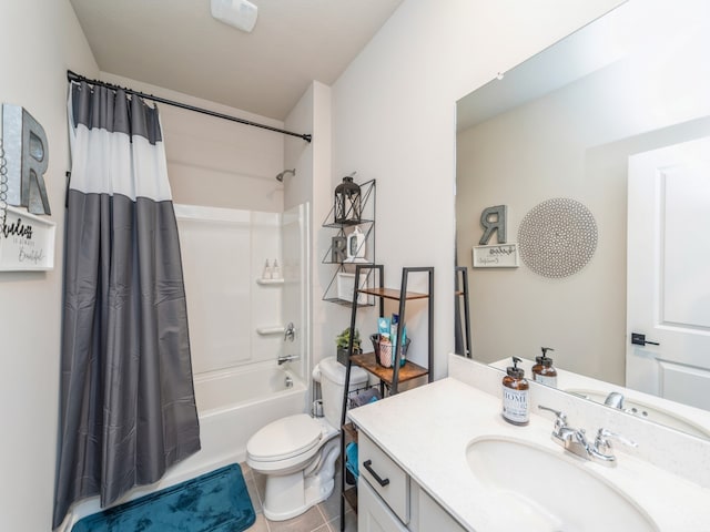 full bathroom with tile patterned floors, shower / bath combination with curtain, toilet, and vanity